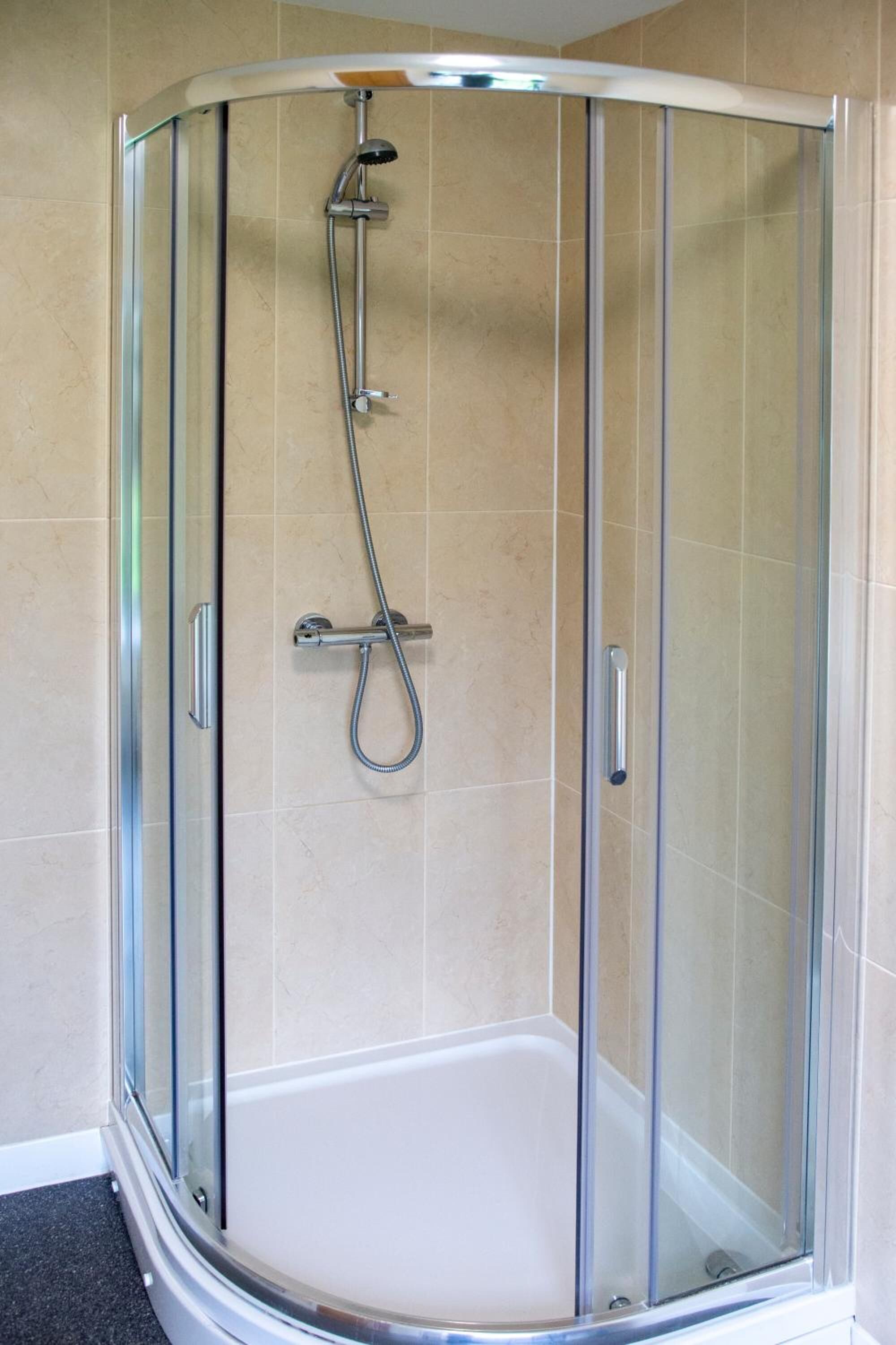 designer toiletries, hair dryer, towels, soap