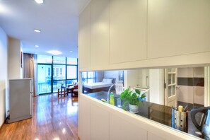 Deluxe Studio | Private kitchen | Fridge, microwave, stovetop, electric kettle