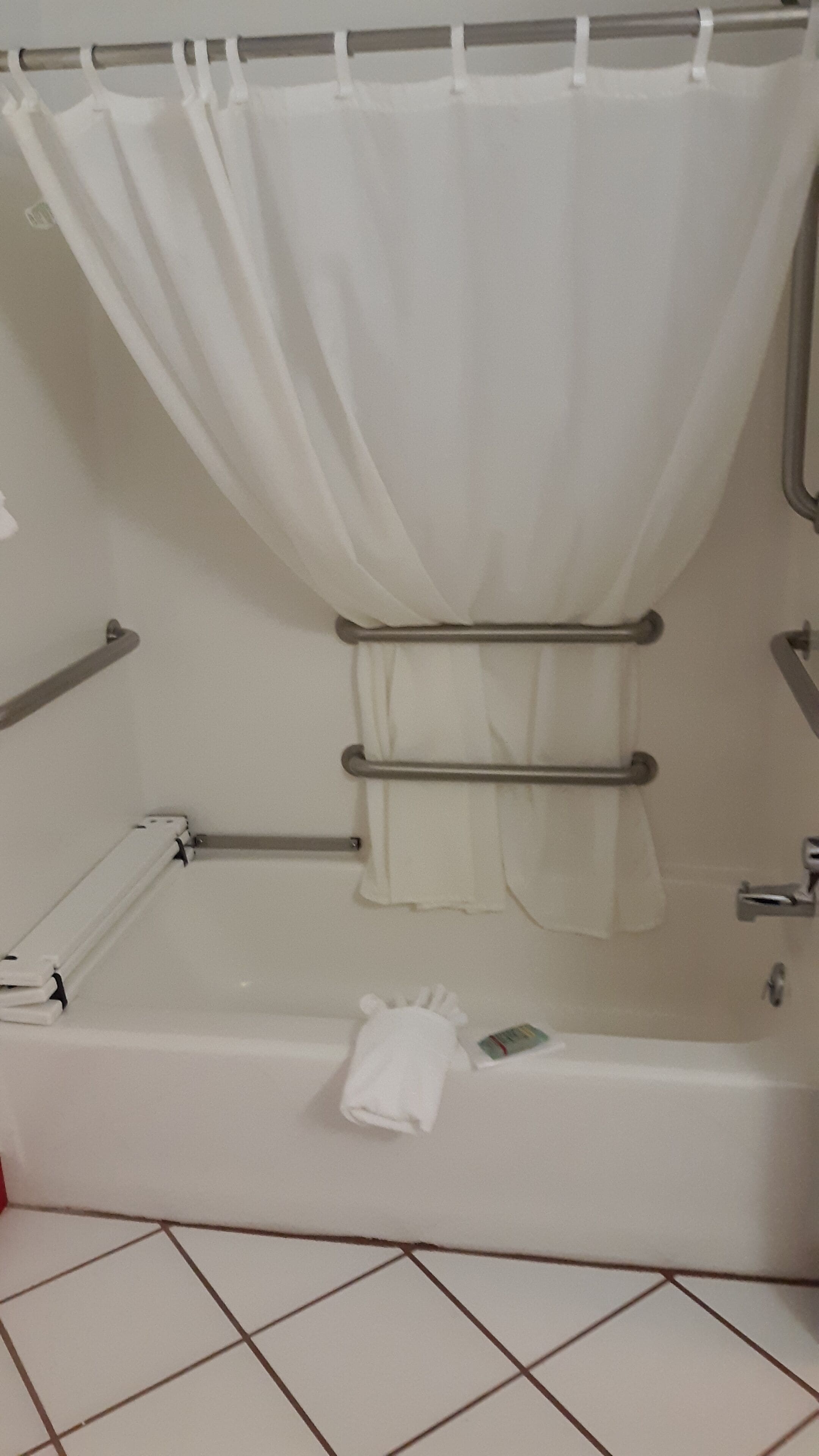 combined shower/bathtub, free toiletries, hair dryer, towels