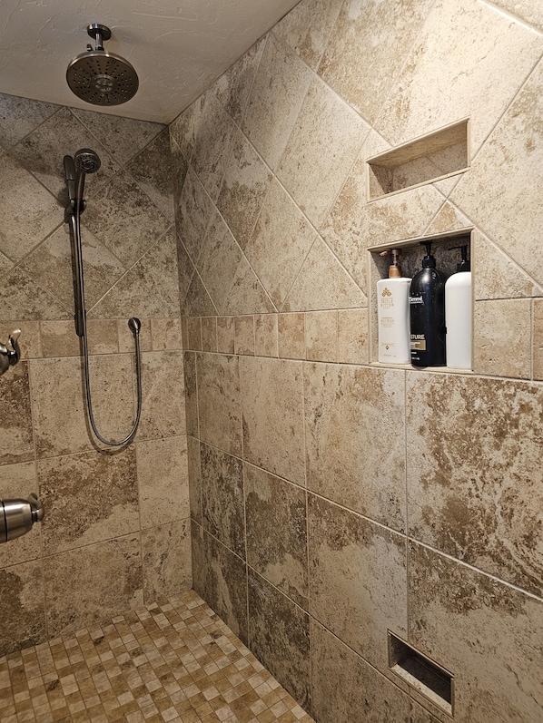 Combined shower/tub, hair dryer, towels, soap