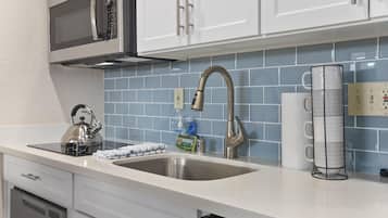 Fridge, microwave, dishwasher, coffee/tea maker