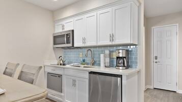 Fridge, microwave, dishwasher, coffee/tea maker