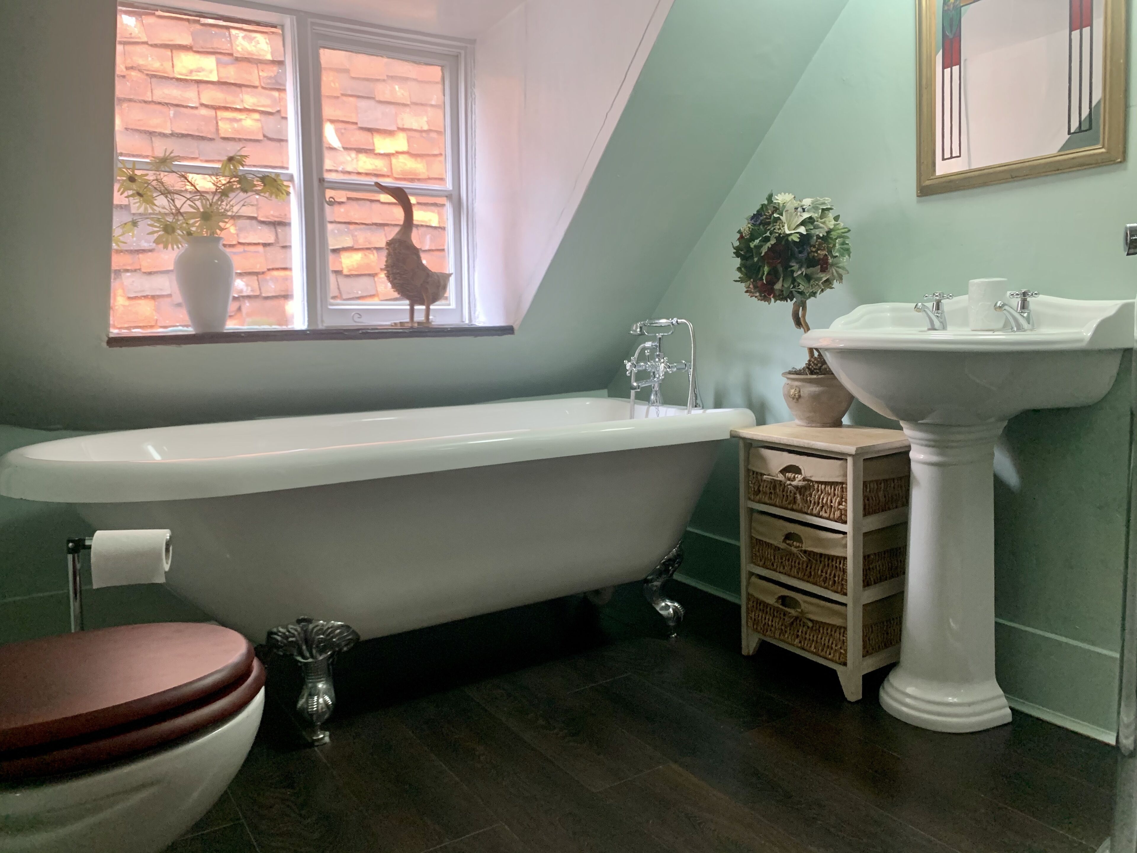 Bathtub, hair dryer, towels, soap