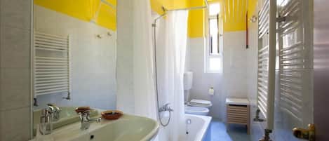 Hair dryer, bidet, towels, soap