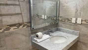 Shower, towels, soap, toilet paper