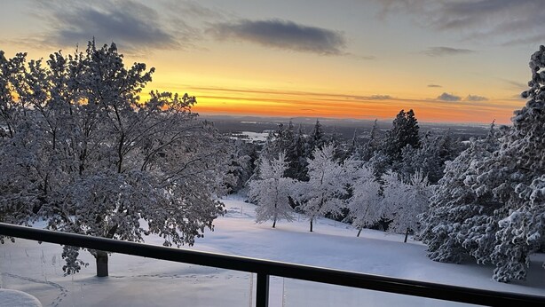 A snow-covered landscape with trees and a clear sky during sunset. - Spacious South Hill View Home, Private Mountain Setting & Hot Tub (Spokane)