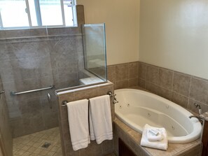 Shower, hair dryer, towels, toilet paper