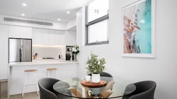 Two Bedroom Penthouse With Parking | Living area | 49-inch Smart TV with digital channels, TV