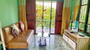 Standard Bungalow | Living area | 36-inch Smart TV with digital channels, TV - Swiss Chalet Garden Pool Resort (Krabi)