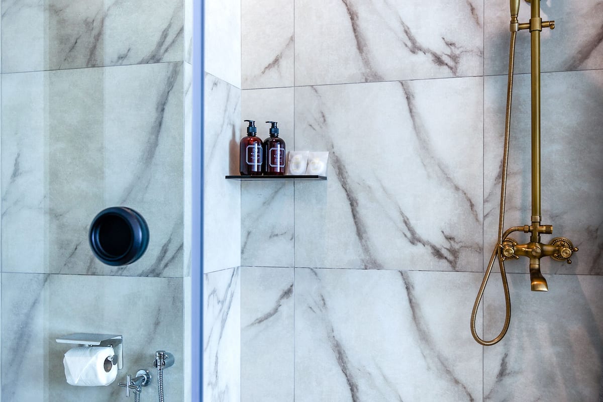 wesley suite | bathroom | shower, rainfall showerhead, free toiletries, hair dryer