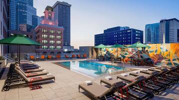 Outdoor pool, open 9:00 AM to 10:00 PM, sun loungers