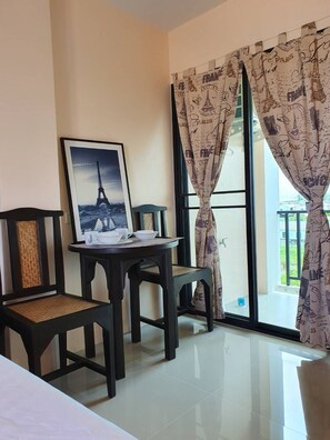 Basic Studio, Multiple Beds | Living area | 32-inch flat-screen TV with cable channels, TV - Samutsakorn Apartment (Samut Sakhon)