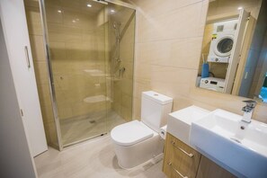 Shower, hair dryer, towels