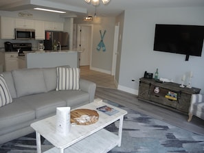 Apartamento, 1 habitación | Zona de estar | Una televisión