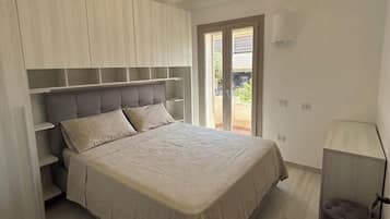 Appartement Deluxe, vue partielle sur la mer | Literie hypoallergénique, literie fournie