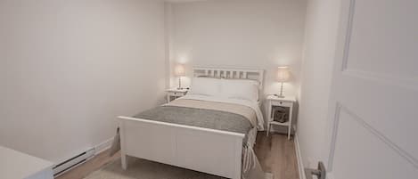 Bedroom 3 with a comfy double bed—your perfect spot for a quiet night.