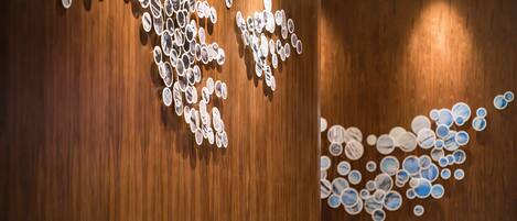 A wooden wall with circular patterns.