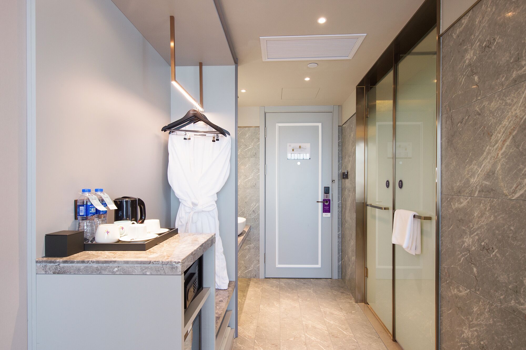 Shower, rainfall showerhead, hair dryer, towels