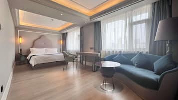 Deluxe Room, 1 King Bed | Down duvets, in-room safe, desk, free WiFi