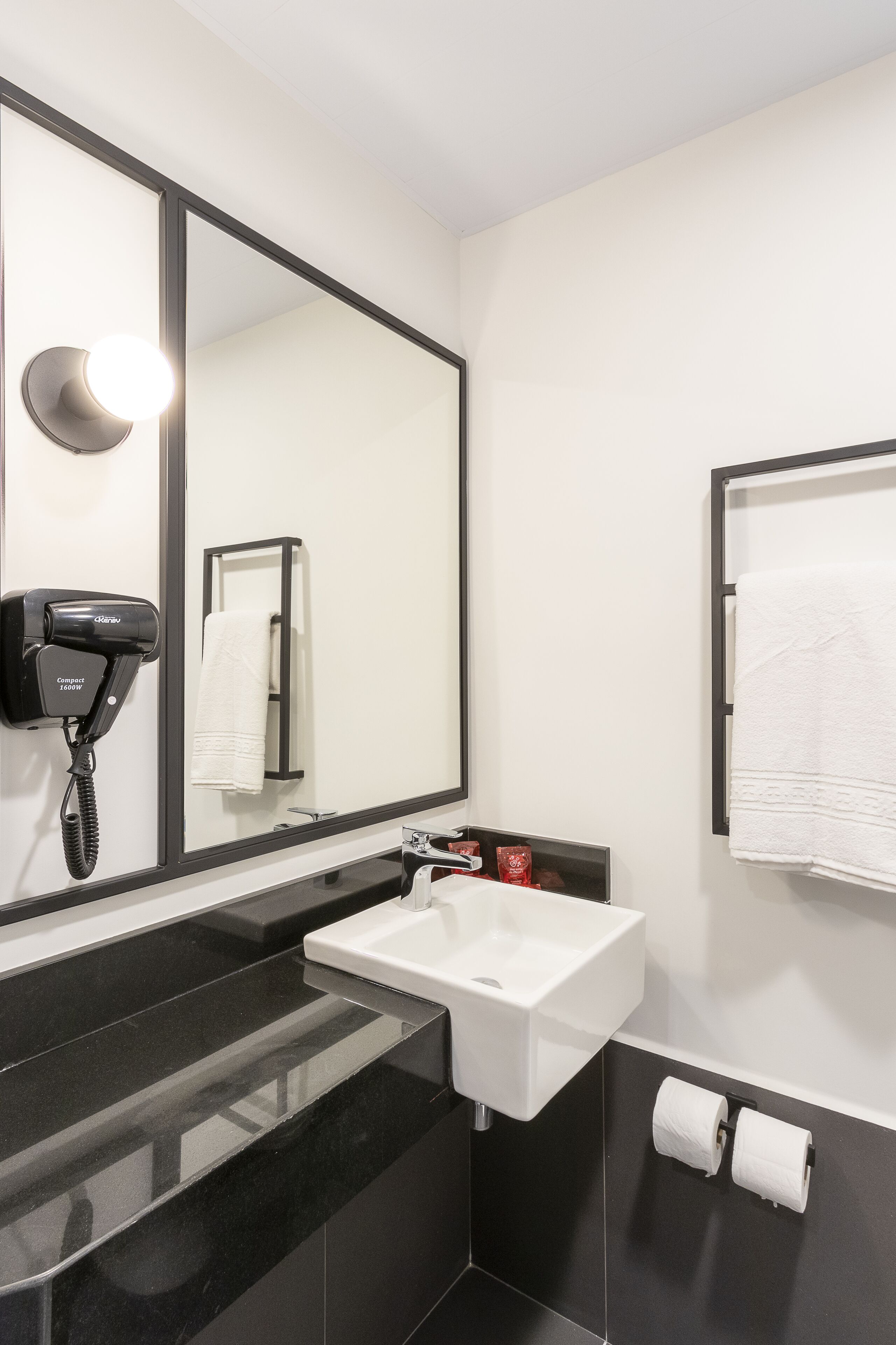 eco-friendly toiletries, hair dryer, towels, soap