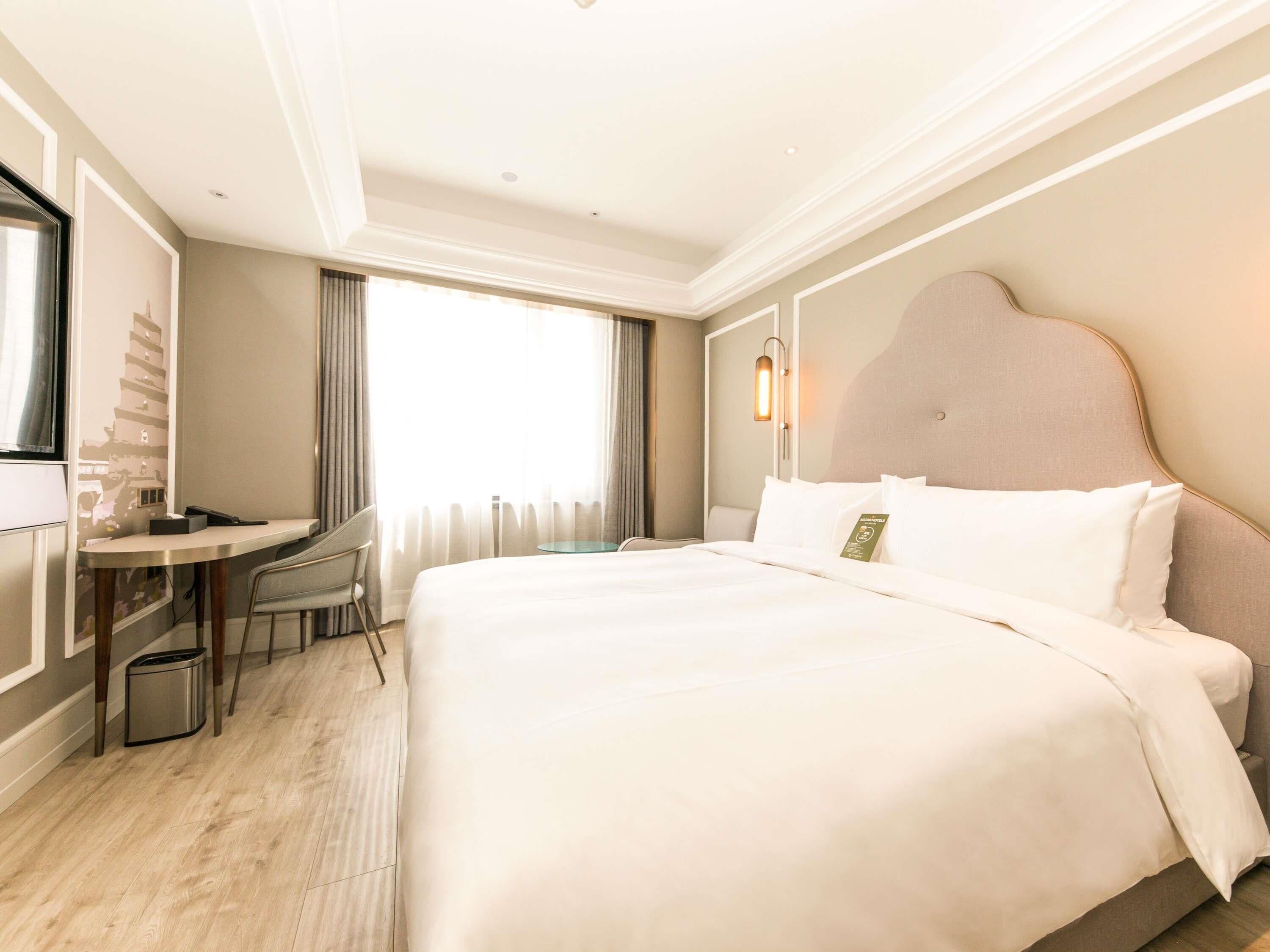 Chambre Deluxe, 1 très grand lit | Minibar, système d’insonorisation, accès au Wi-Fi (inclus)