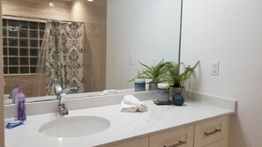 Hair dryer, towels, soap, shampoo