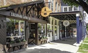 A storefront with a sign for 'Elicottville Coffee Co.' and 'Alpine Bistro.'