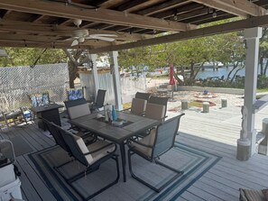 Outdoor dining - Private historical completely renovated cottage with  60 ft dock on Sarasota Bay (cortez)