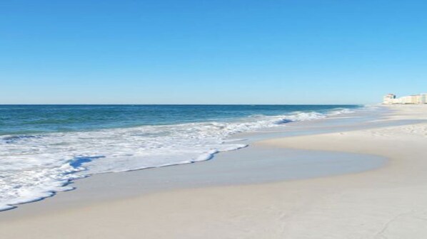 On the beach, sun-loungers