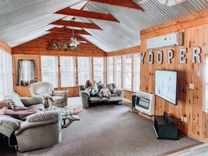 Smart TV, fireplace, DVD player, books