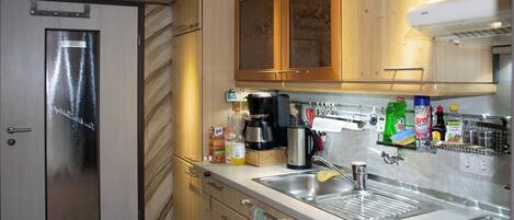 Fridge, microwave, stovetop, coffee/tea maker