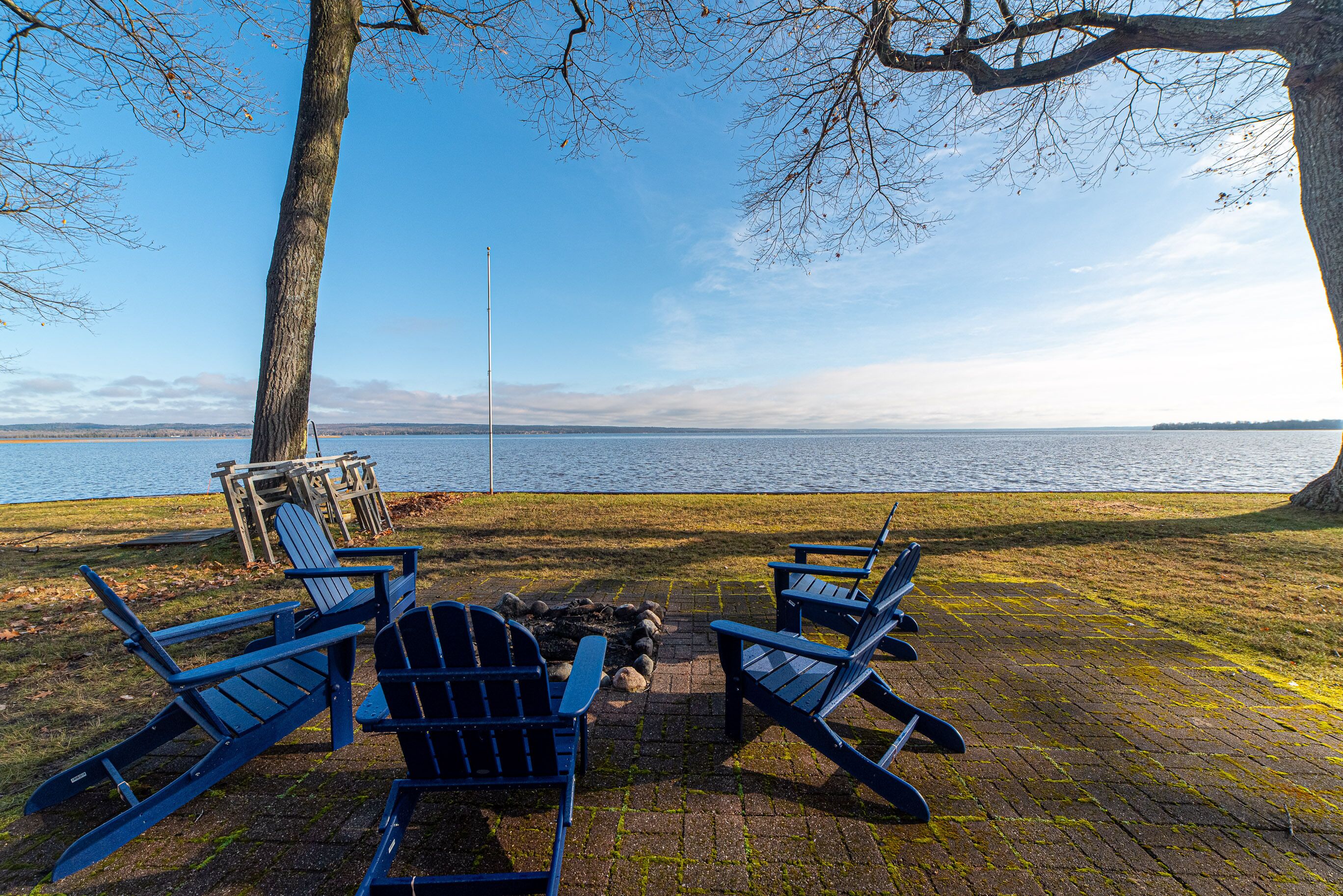 Perfection: Adirondack chairs and fire pit overlooking the lake
