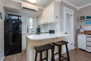 Fridge, microwave, oven, stovetop - Treasure Island 1-BR Retreat with Pool View - Tropic Terrace Resort #32 (Treasure Island)