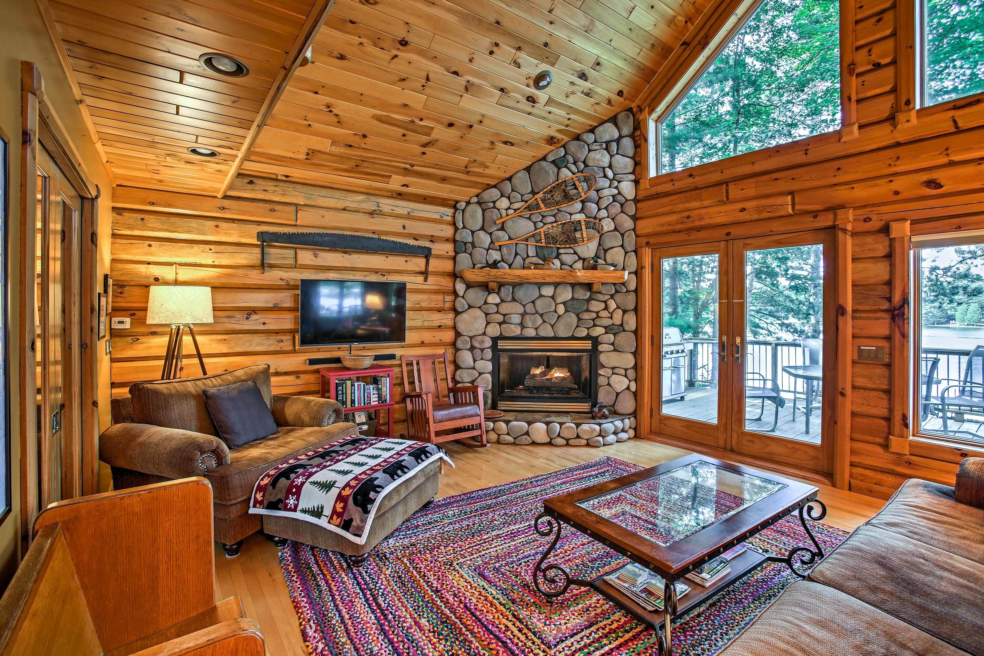 Tranquil Lakefront Log Home with Fireplace, Private Dock and Hot Tub!