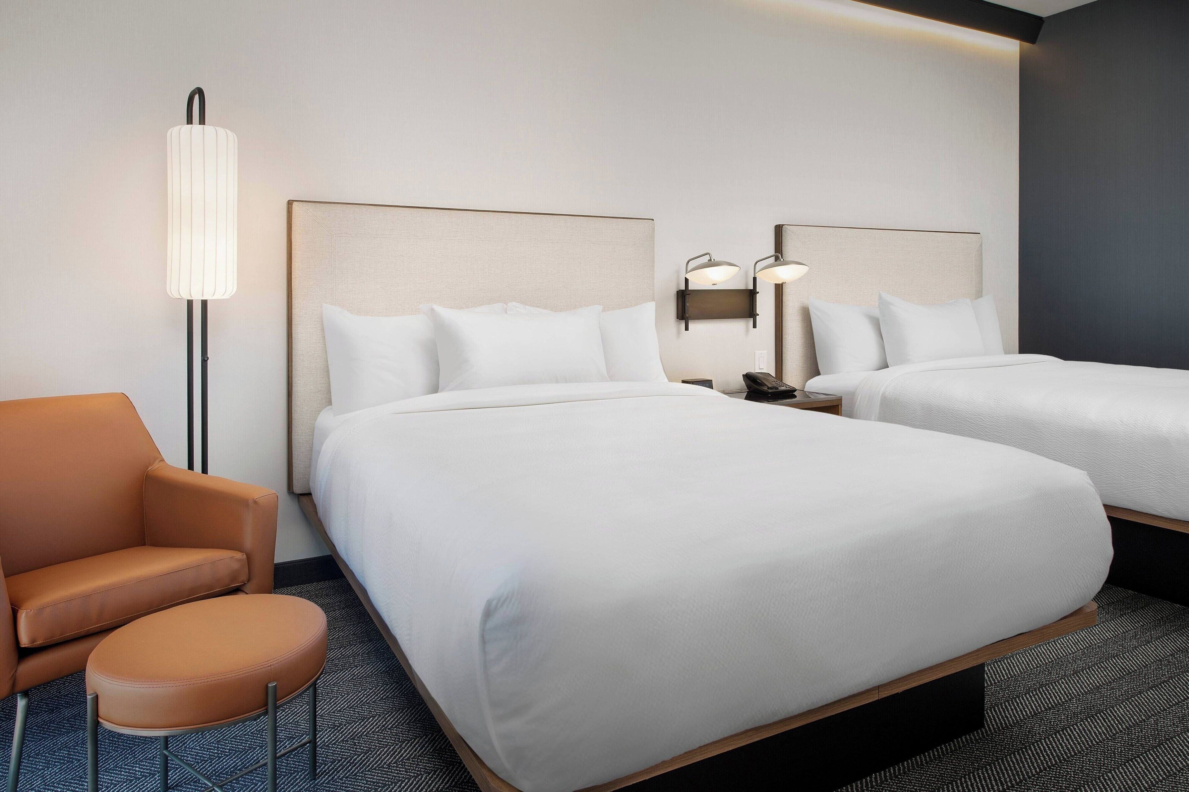 premium bedding, desk, laptop workspace, iron/ironing board