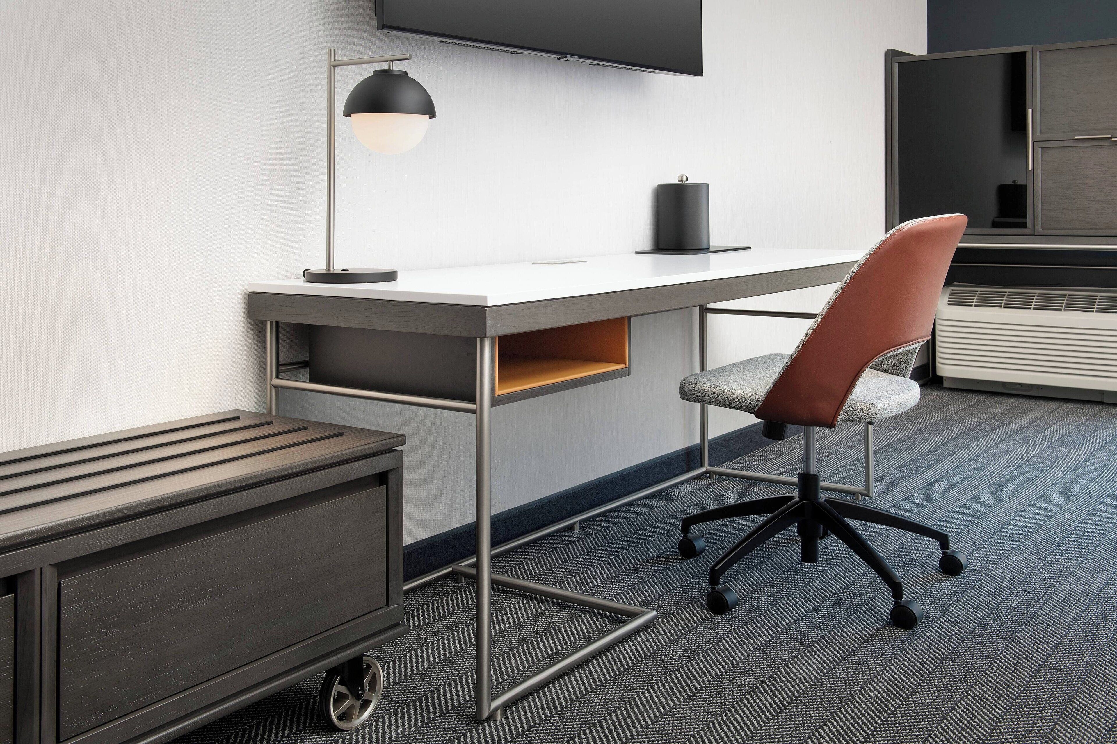 premium bedding, desk, laptop workspace, iron/ironing board