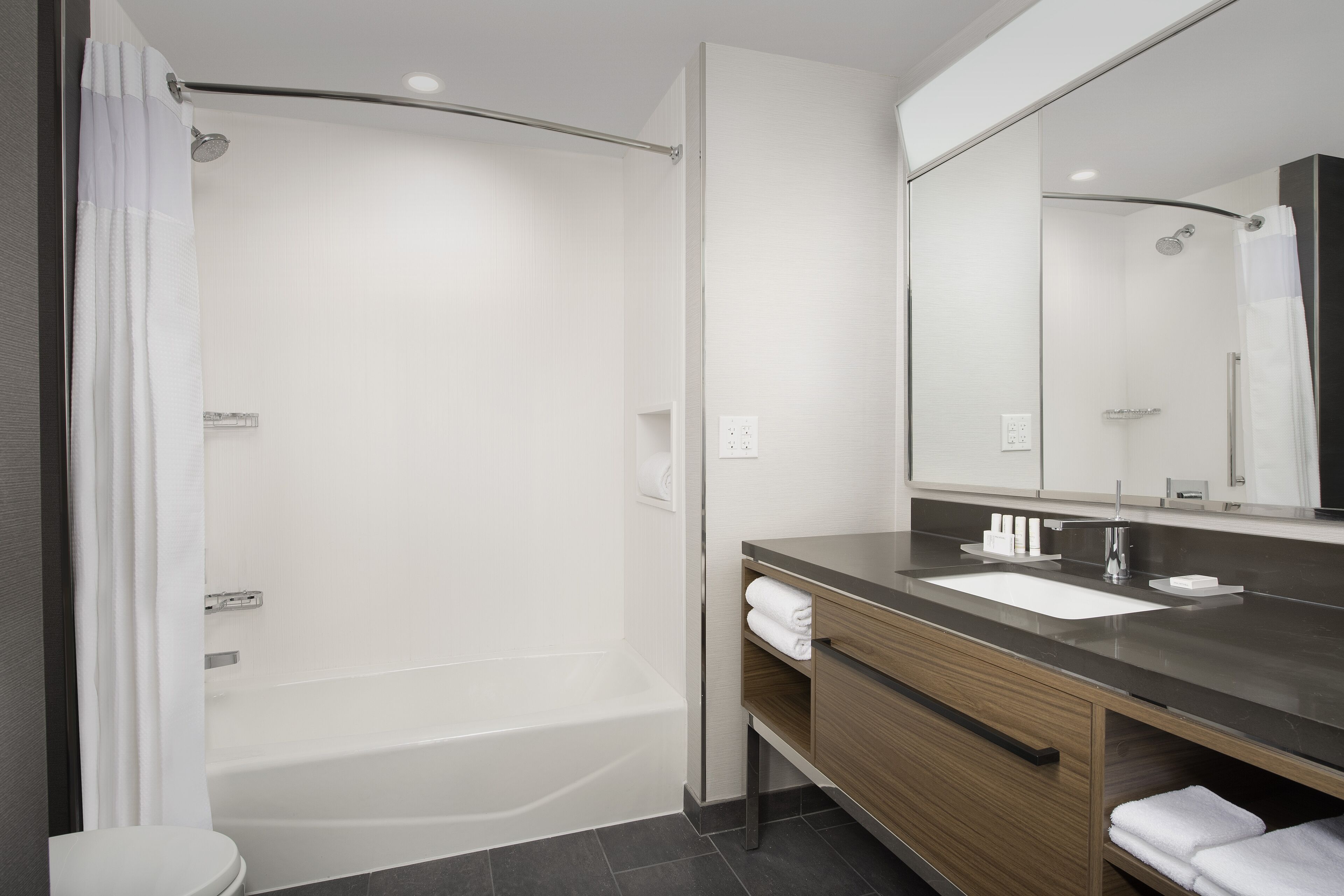 free toiletries, hair dryer, soap, shampoo