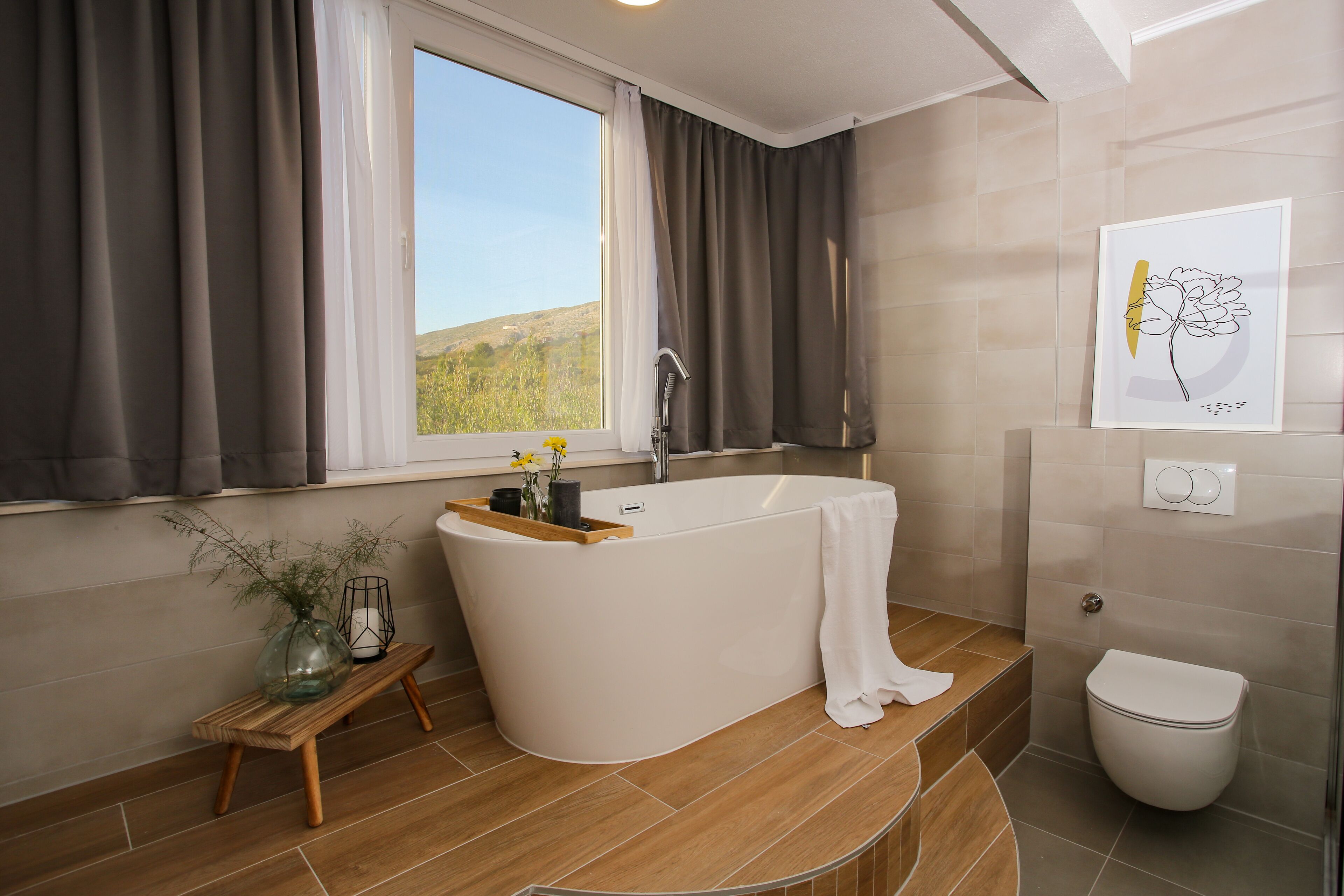 Bathtub, hair dryer, bidet, towels
