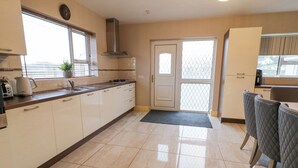 Cottage | Private kitchen | Fridge, microwave, dishwasher, electric kettle