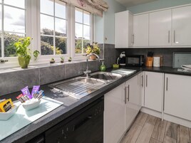 Fridge, dishwasher, electric kettle, cookware/dishes/utensils