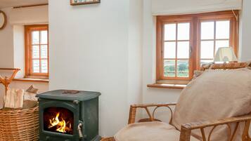 Cottage | Salle de séjour | Cheminée