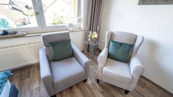 Comfort Apartment | Living area | Flat-screen TV