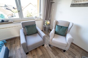 Comfort Apartment | Living area | Flat-screen TV