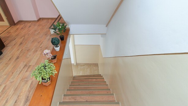 A wooden staircase with a bench on the left, leading to a landing. - House 2063/32559 (Istria - Poreč), 6000m from the beach (Poreč)