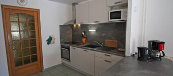 Charming Cottage with Fireplace, Terrace, and Baby Amenities near Bourbonne-les-Bains