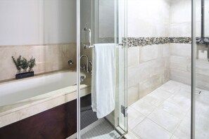 Bathtub, towels, soap, shampoo