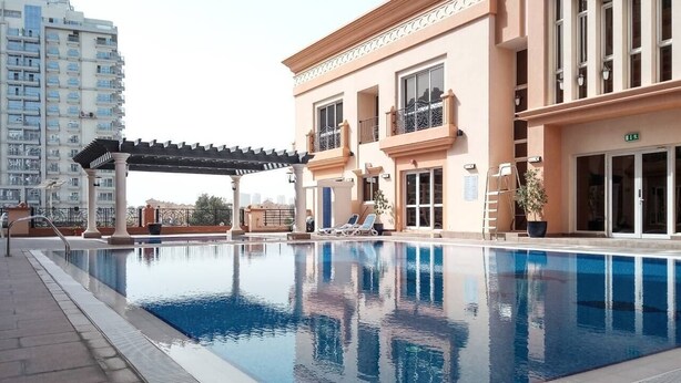 Outdoor pool - Radiant & Cozy Studio Apartment In Sports City (Dubai)