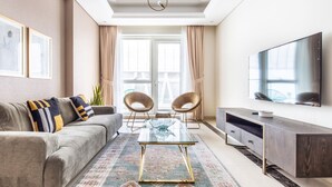 Living room - Plush 3BR w/ Study in Prime District - Downtown Dubai! (Dubai)