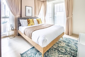 1 bedroom, laptop workspace, iron/ironing board, bed sheets