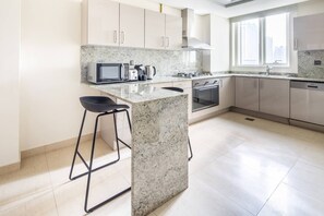 Microwave, oven, stovetop, dishwasher - Plush 3BR w/ Study in Prime District - Downtown Dubai! (Dubai)